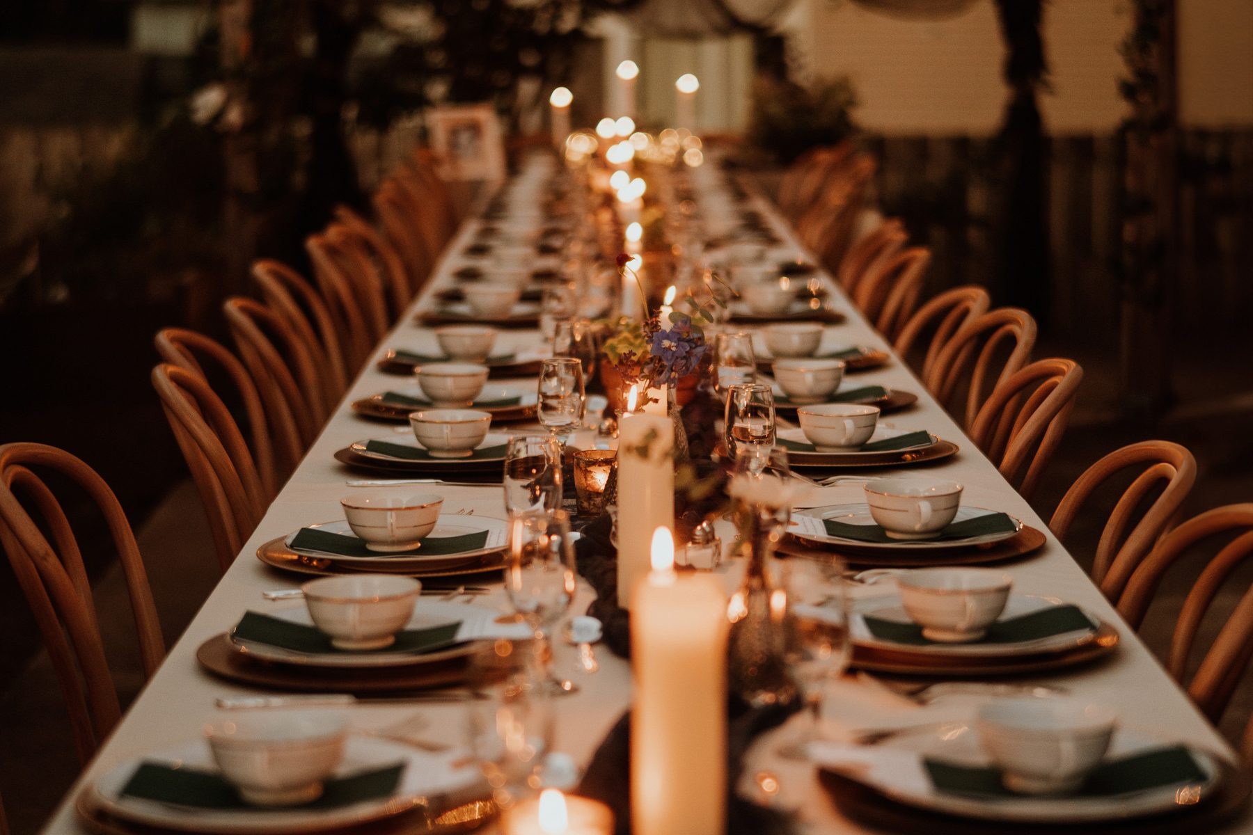 A candlelit reception table set by the Virgo team