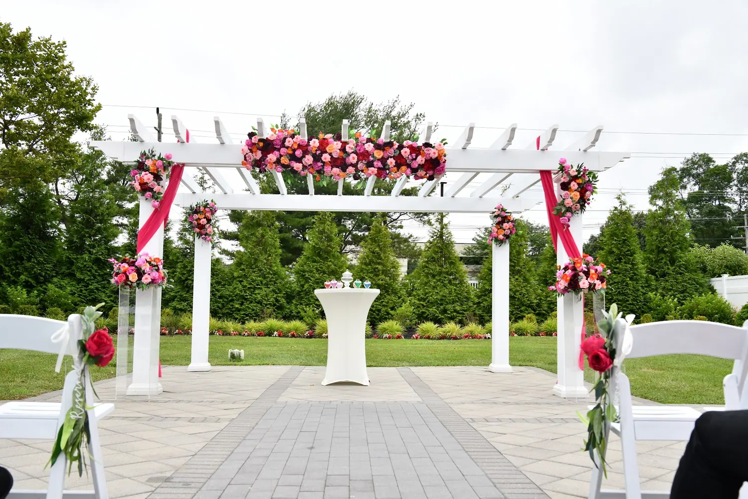 Floral pergola set for the outdoor ceremony