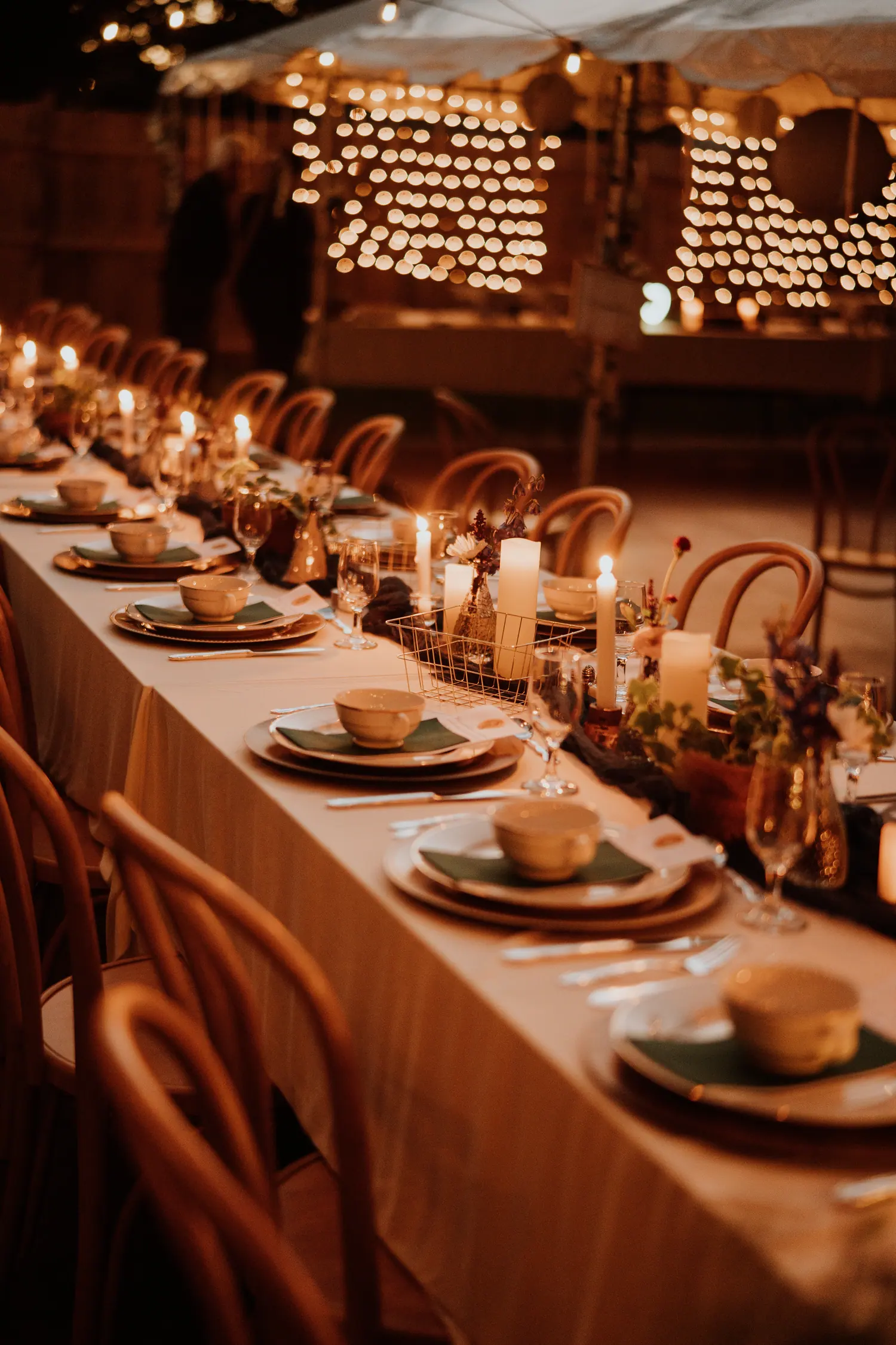 Tablescape with greenery and low candles