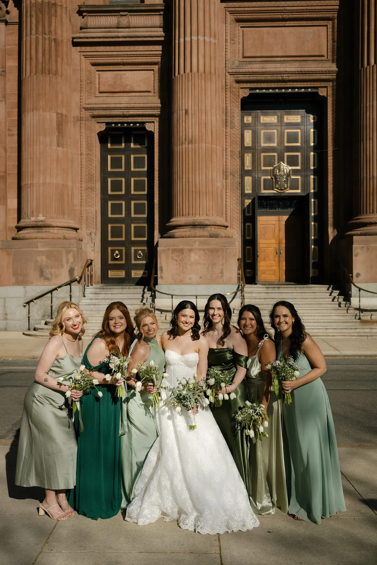 The wedding party on the museum steps